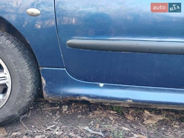 Синий Пежо 206, объемом двигателя 1.1 л и пробегом 141 тыс. км за 1700 $, фото 19 на Automoto.ua