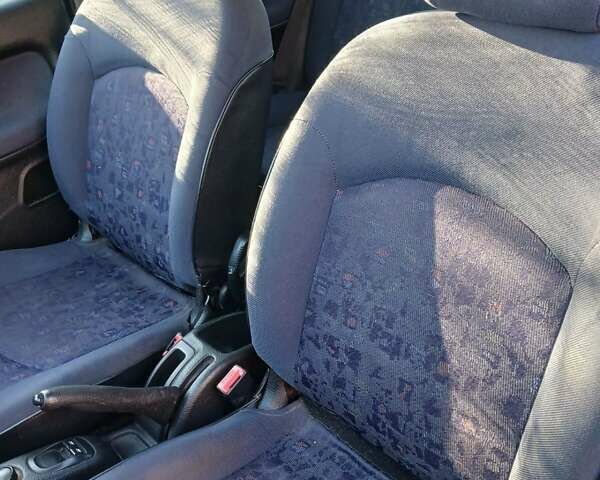 Синий Пежо 206, объемом двигателя 1.1 л и пробегом 141 тыс. км за 1700 $, фото 13 на Automoto.ua