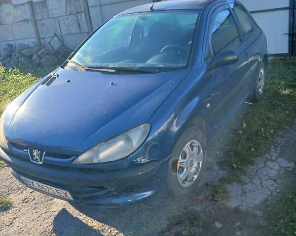 Синий Пежо 206, объемом двигателя 1.1 л и пробегом 141 тыс. км за 1700 $, фото 4 на Automoto.ua