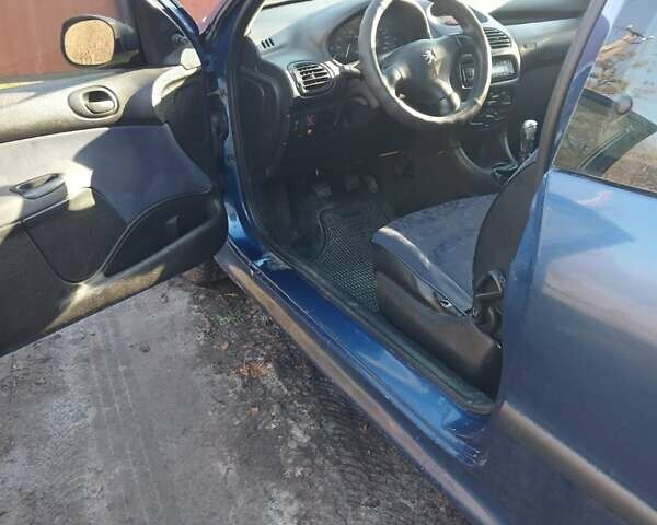 Синий Пежо 206, объемом двигателя 1.1 л и пробегом 141 тыс. км за 1700 $, фото 17 на Automoto.ua
