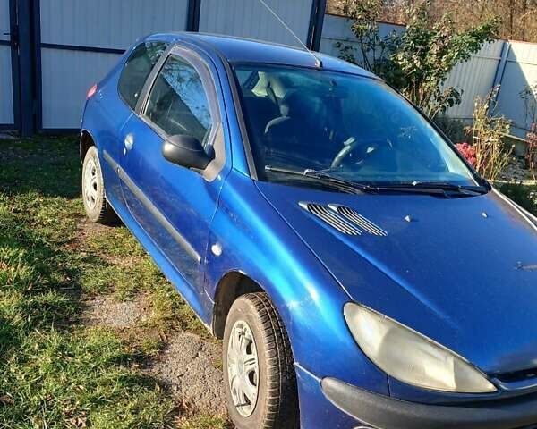 Синий Пежо 206, объемом двигателя 1.1 л и пробегом 141 тыс. км за 1700 $, фото 1 на Automoto.ua