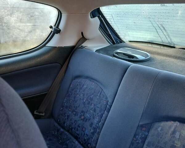 Синий Пежо 206, объемом двигателя 1.1 л и пробегом 141 тыс. км за 1700 $, фото 11 на Automoto.ua