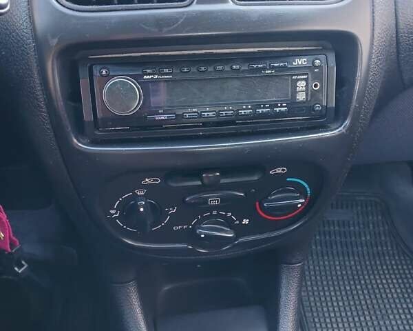 Синий Пежо 206, объемом двигателя 1.1 л и пробегом 141 тыс. км за 1700 $, фото 10 на Automoto.ua