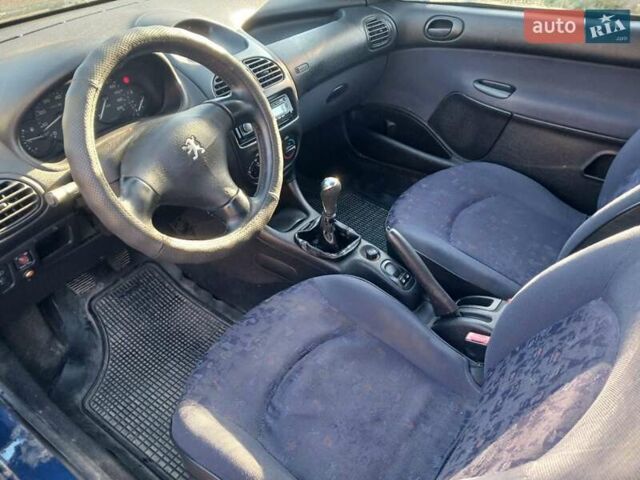 Синий Пежо 206, объемом двигателя 1.1 л и пробегом 141 тыс. км за 1700 $, фото 12 на Automoto.ua