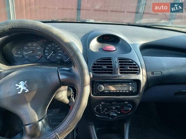 Синий Пежо 206, объемом двигателя 1.1 л и пробегом 141 тыс. км за 1700 $, фото 8 на Automoto.ua