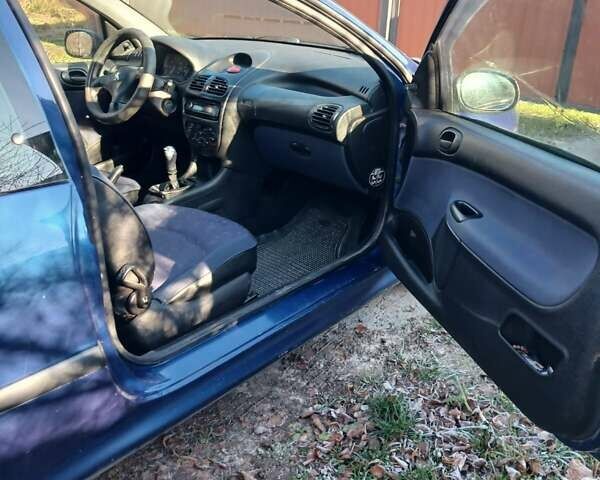 Синий Пежо 206, объемом двигателя 1.1 л и пробегом 141 тыс. км за 1700 $, фото 22 на Automoto.ua