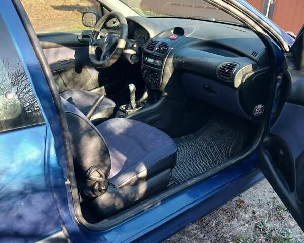 Синий Пежо 206, объемом двигателя 1.1 л и пробегом 141 тыс. км за 1700 $, фото 16 на Automoto.ua