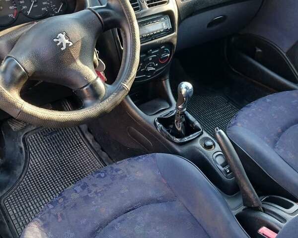 Синий Пежо 206, объемом двигателя 1.1 л и пробегом 141 тыс. км за 1700 $, фото 7 на Automoto.ua