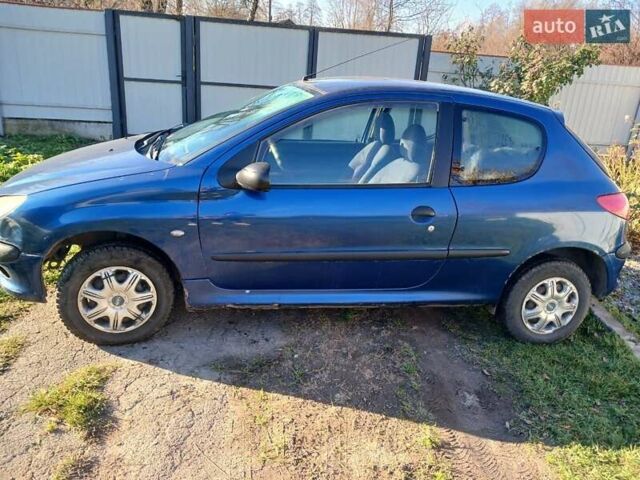 Синий Пежо 206, объемом двигателя 1.1 л и пробегом 141 тыс. км за 1700 $, фото 5 на Automoto.ua
