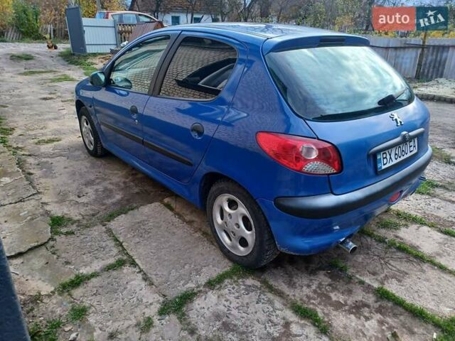 Синий Пежо 206, объемом двигателя 1.6 л и пробегом 202 тыс. км за 2900 $, фото 1 на Automoto.ua