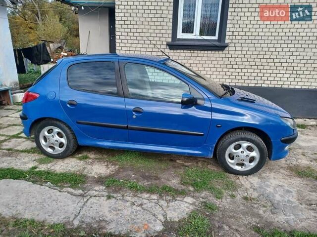 Синий Пежо 206, объемом двигателя 1.6 л и пробегом 202 тыс. км за 2900 $, фото 8 на Automoto.ua