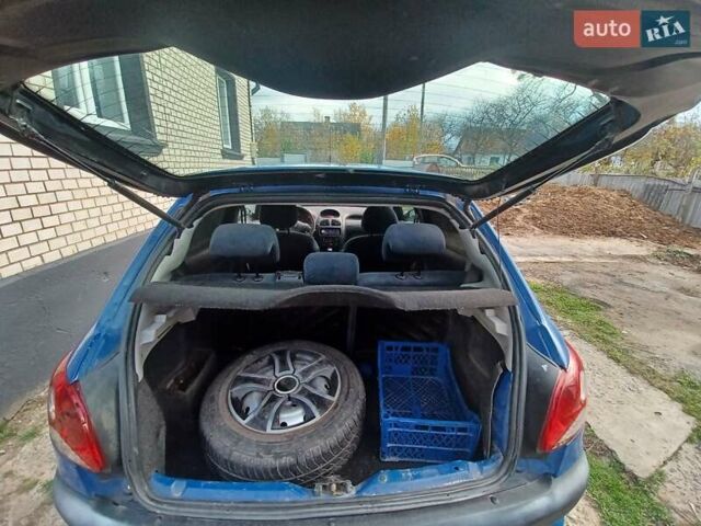 Синий Пежо 206, объемом двигателя 1.6 л и пробегом 202 тыс. км за 2900 $, фото 18 на Automoto.ua