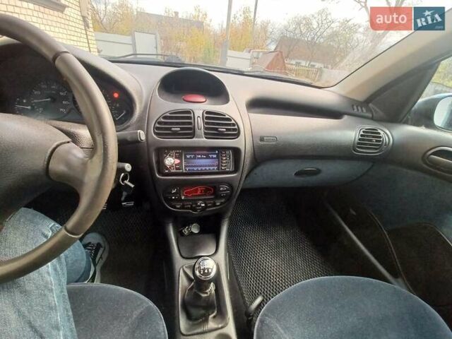 Синий Пежо 206, объемом двигателя 1.6 л и пробегом 202 тыс. км за 2900 $, фото 9 на Automoto.ua
