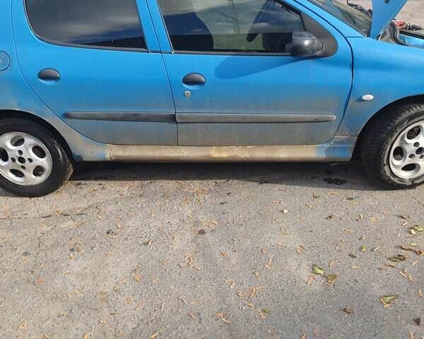 Синий Пежо 206, объемом двигателя 1.4 л и пробегом 300 тыс. км за 2500 $, фото 7 на Automoto.ua