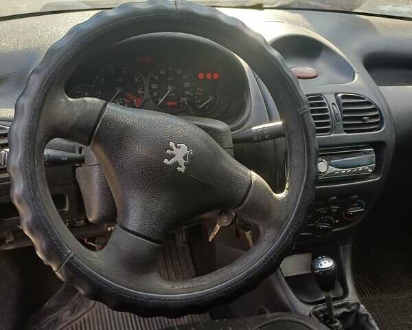 Синий Пежо 206, объемом двигателя 1.4 л и пробегом 300 тыс. км за 2500 $, фото 2 на Automoto.ua