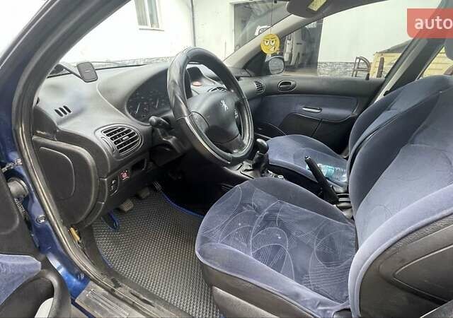 Синий Пежо 206, объемом двигателя 1.4 л и пробегом 277 тыс. км за 2941 $, фото 8 на Automoto.ua