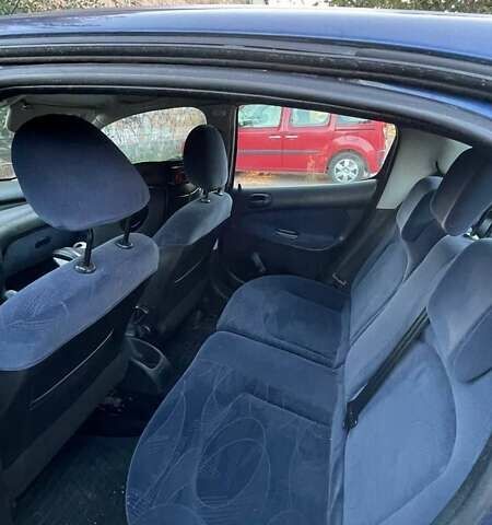 Синий Пежо 206, объемом двигателя 1.36 л и пробегом 208 тыс. км за 3100 $, фото 6 на Automoto.ua