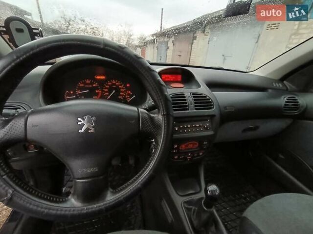 Синій Пежо 206, об'ємом двигуна 2 л та пробігом 270 тис. км за 2450 $, фото 2 на Automoto.ua