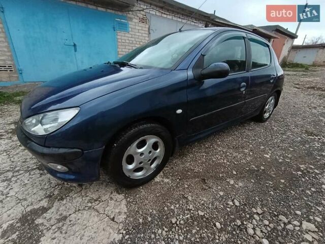 Синій Пежо 206, об'ємом двигуна 2 л та пробігом 270 тис. км за 2450 $, фото 4 на Automoto.ua