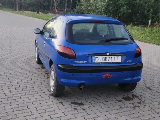 Синий Пежо 206, объемом двигателя 1.1 л и пробегом 240 тыс. км за 2300 $, фото 2 на Automoto.ua