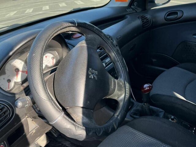 Синий Пежо 206, объемом двигателя 1.4 л и пробегом 231 тыс. км за 2500 $, фото 6 на Automoto.ua