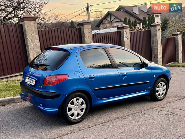 Синий Пежо 206, объемом двигателя 1.4 л и пробегом 133 тыс. км за 5500 $, фото 100 на Automoto.ua