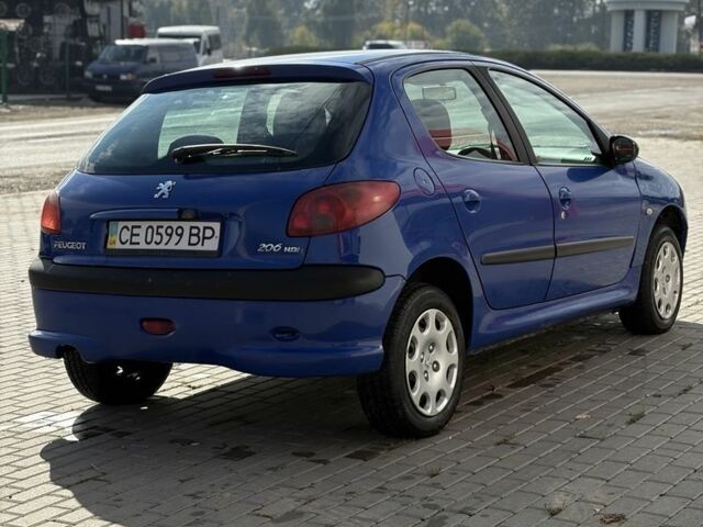Синий Пежо 206, объемом двигателя 1.4 л и пробегом 265 тыс. км за 1999 $, фото 4 на Automoto.ua