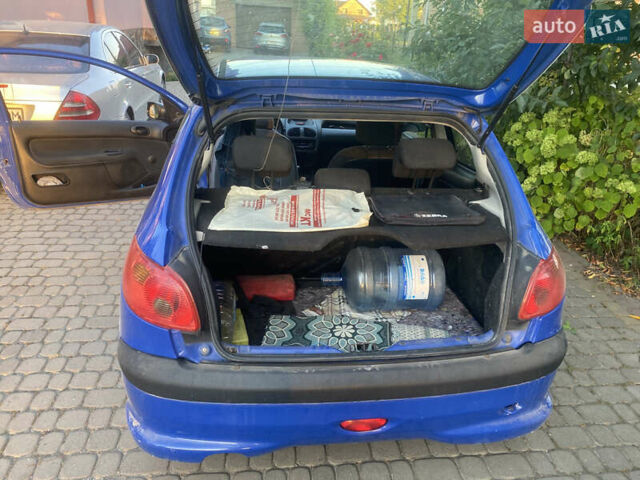 Синий Пежо 206, объемом двигателя 1.1 л и пробегом 250 тыс. км за 2100 $, фото 8 на Automoto.ua