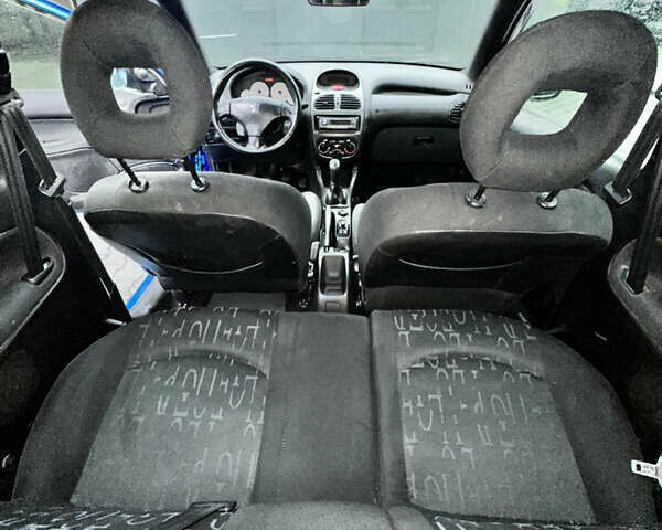 Синий Пежо 206, объемом двигателя 1.6 л и пробегом 245 тыс. км за 2499 $, фото 68 на Automoto.ua