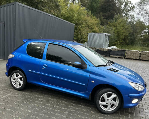 Синий Пежо 206, объемом двигателя 1.6 л и пробегом 245 тыс. км за 2499 $, фото 7 на Automoto.ua