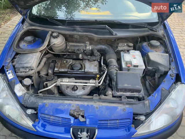 Синий Пежо 206, объемом двигателя 1.1 л и пробегом 250 тыс. км за 2100 $, фото 6 на Automoto.ua