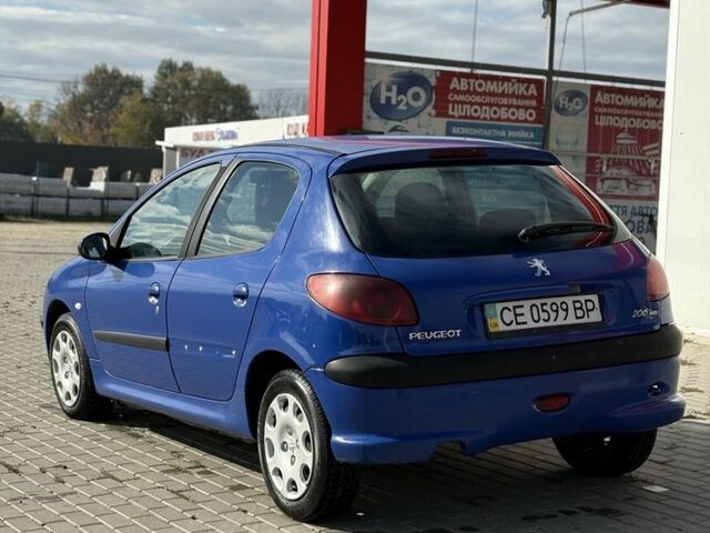 Синий Пежо 206, объемом двигателя 1.4 л и пробегом 265 тыс. км за 1999 $, фото 5 на Automoto.ua
