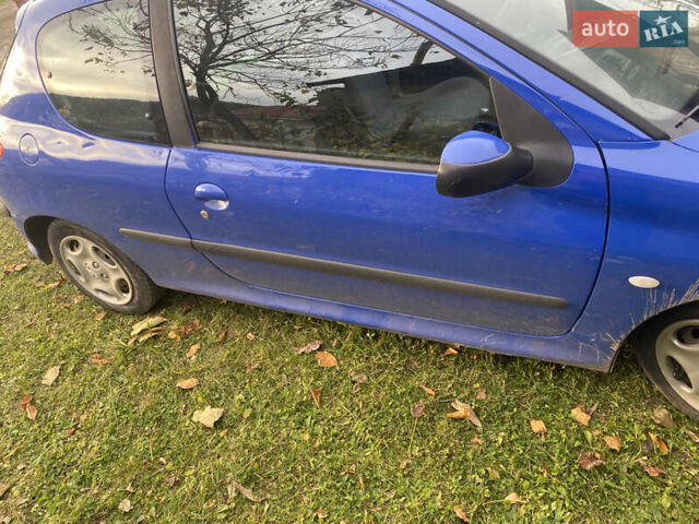 Синий Пежо 206, объемом двигателя 1.1 л и пробегом 250 тыс. км за 2100 $, фото 10 на Automoto.ua