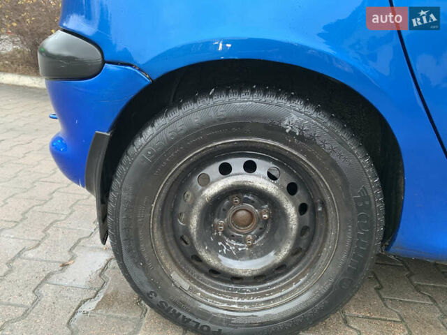 Синий Пежо 206, объемом двигателя 1.1 л и пробегом 261 тыс. км за 2400 $, фото 3 на Automoto.ua