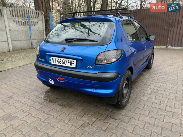 Синий Пежо 206, объемом двигателя 1.1 л и пробегом 261 тыс. км за 2400 $, фото 4 на Automoto.ua
