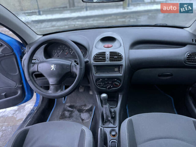 Синий Пежо 206, объемом двигателя 1.4 л и пробегом 242 тыс. км за 1999 $, фото 9 на Automoto.ua