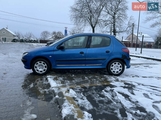 Синий Пежо 206, объемом двигателя 1.4 л и пробегом 242 тыс. км за 1999 $, фото 2 на Automoto.ua