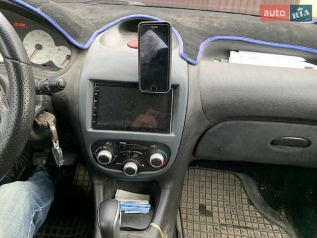 Синий Пежо 206, объемом двигателя 1.1 л и пробегом 261 тыс. км за 2400 $, фото 9 на Automoto.ua