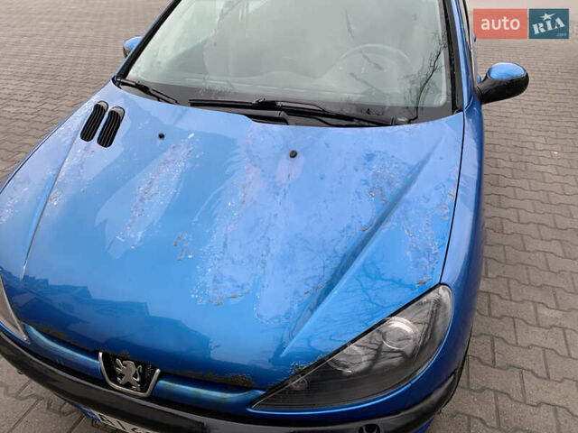 Синий Пежо 206, объемом двигателя 1.1 л и пробегом 261 тыс. км за 2400 $, фото 6 на Automoto.ua