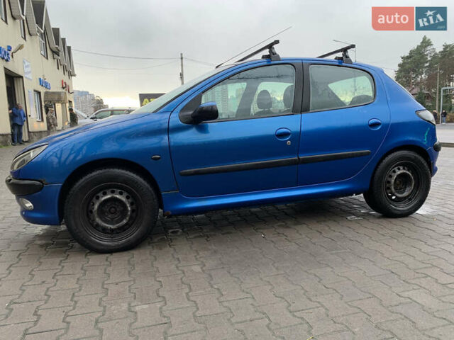 Синий Пежо 206, объемом двигателя 1.1 л и пробегом 261 тыс. км за 2400 $, фото 5 на Automoto.ua