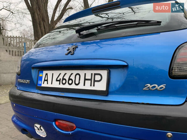 Синий Пежо 206, объемом двигателя 1.1 л и пробегом 261 тыс. км за 2400 $, фото 7 на Automoto.ua