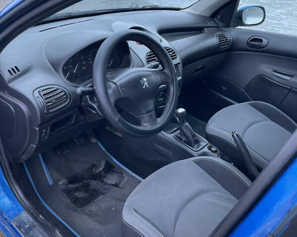 Синий Пежо 206, объемом двигателя 1.4 л и пробегом 242 тыс. км за 1999 $, фото 10 на Automoto.ua