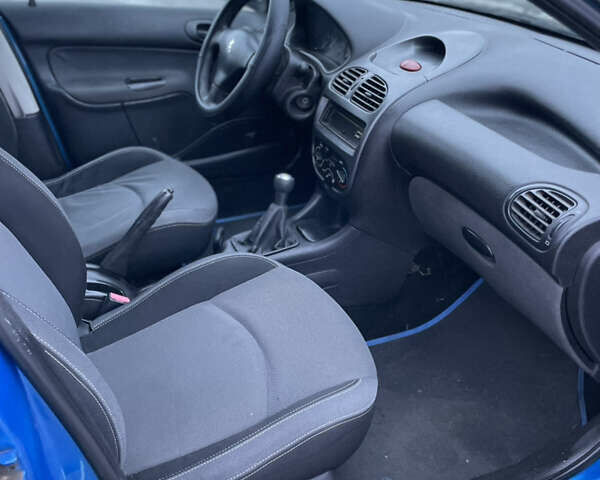 Синий Пежо 206, объемом двигателя 1.4 л и пробегом 242 тыс. км за 1999 $, фото 7 на Automoto.ua