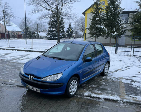 Синий Пежо 206, объемом двигателя 1.4 л и пробегом 242 тыс. км за 1999 $, фото 3 на Automoto.ua