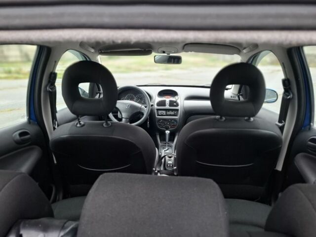 Синий Пежо 206, объемом двигателя 1.4 л и пробегом 153 тыс. км за 4350 $, фото 3 на Automoto.ua