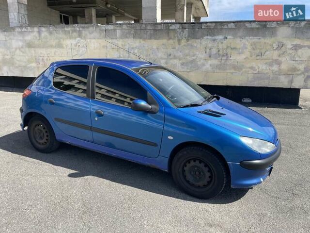 Синий Пежо 206, объемом двигателя 1.36 л и пробегом 360 тыс. км за 2600 $, фото 1 на Automoto.ua