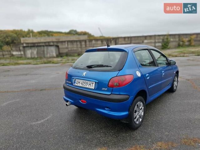 Синий Пежо 206, объемом двигателя 1.36 л и пробегом 153 тыс. км за 4400 $, фото 4 на Automoto.ua