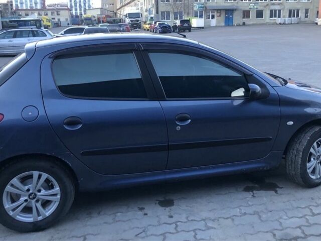 Синій Пежо 206, об'ємом двигуна 1.4 л та пробігом 250 тис. км за 3000 $, фото 5 на Automoto.ua