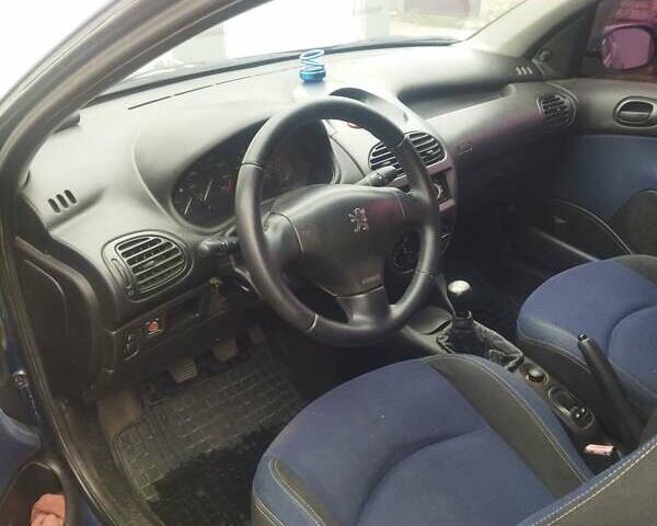 Синий Пежо 206, объемом двигателя 1.4 л и пробегом 307 тыс. км за 2900 $, фото 11 на Automoto.ua