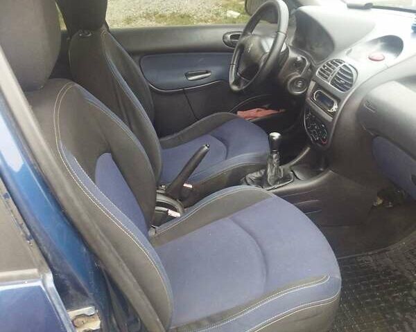 Синий Пежо 206, объемом двигателя 1.4 л и пробегом 307 тыс. км за 2900 $, фото 12 на Automoto.ua